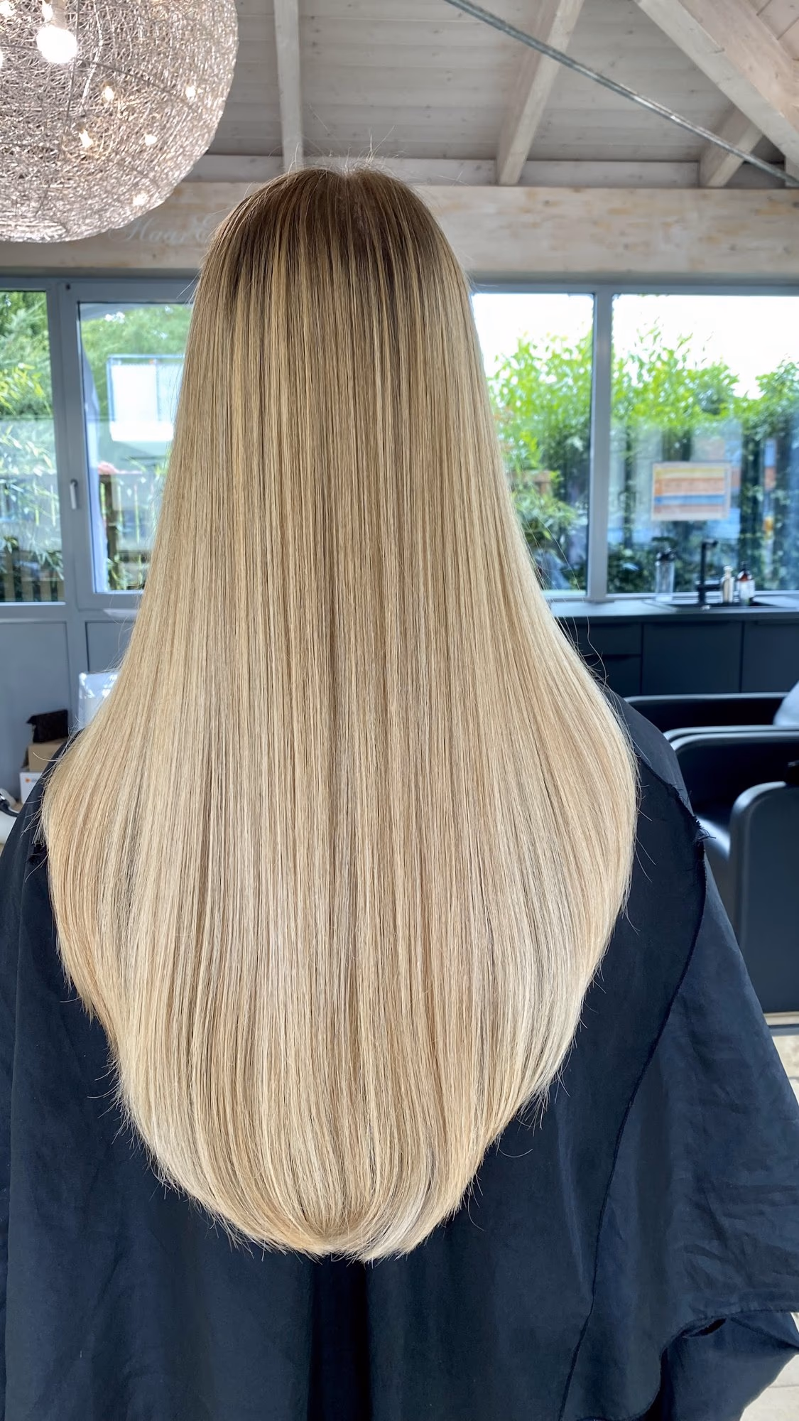 Balayage in Blond mit weichen Wellen, Rückansicht, bei Haar Exakt in Augsburg-Pfersee